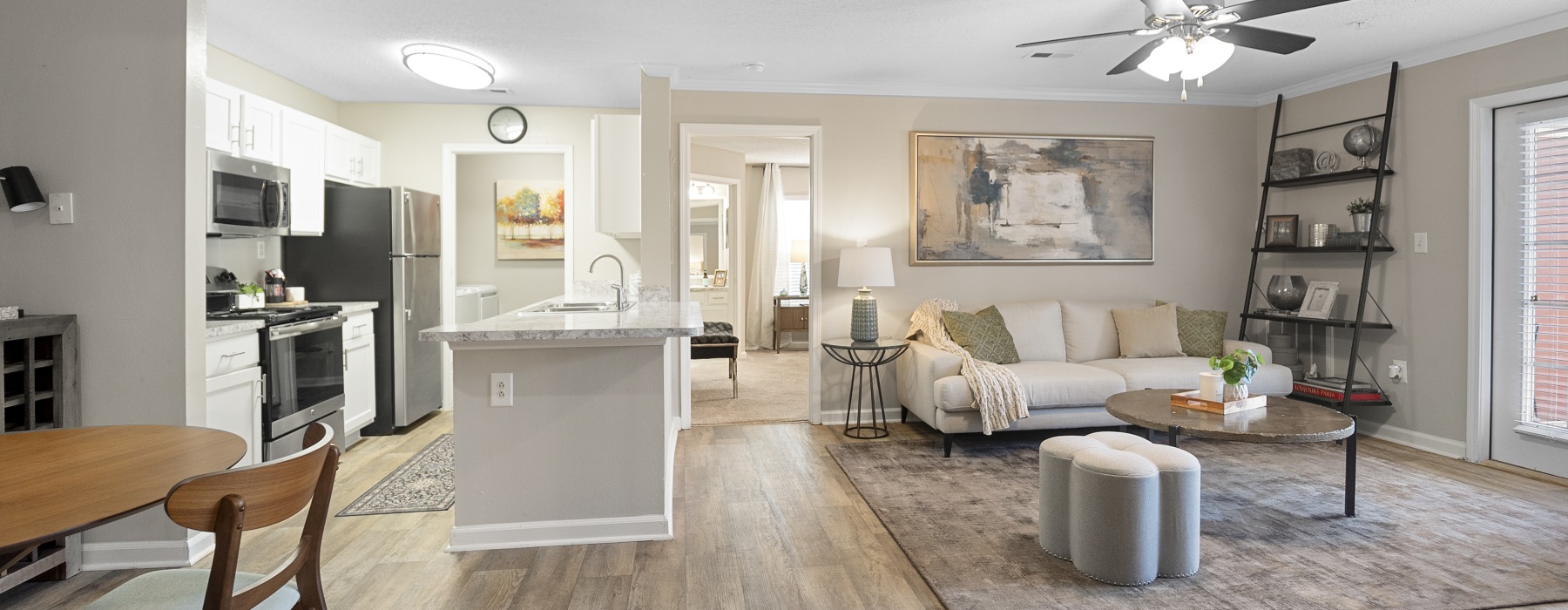 spacious living room with ample lighting