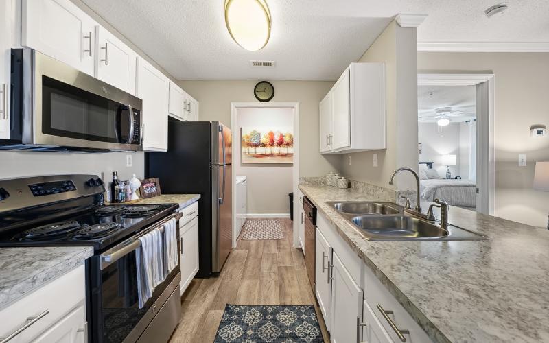 galley kitchen with access to laundry room