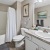 shower/tub combo in bright bathroom